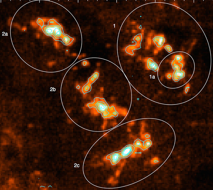 Esta imagen de un radiotelescopio muestra una enorme región de formación estelar de la galaxia exterior de la Vía Láctea. Los óvalos identifican las principales subdivisiones de la nube molecular de la región, incluida la más pequeña 1a, que es muy eficiente para producir estrellas